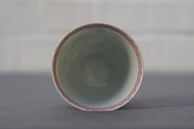 A Chinese famille rose cup and saucer with roosters, Yongzheng