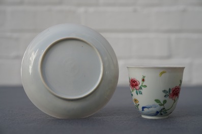 A Chinese famille rose cup and saucer with roosters, Yongzheng