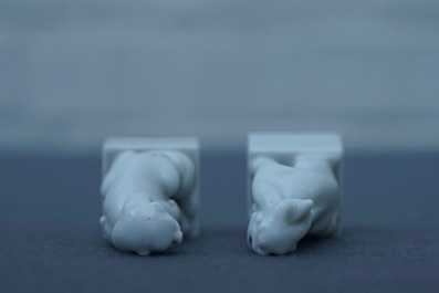 A pair of Chinese Dehua blanc de Chine seals with lions, impressed sealmarks, Kangxi