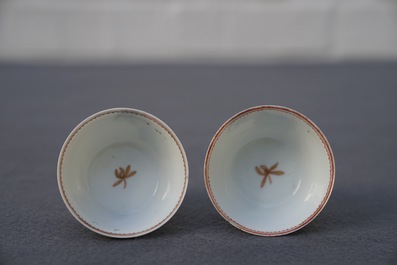 A pair of fine Chinese cups and saucers with roosters and chickens, Qianlong