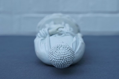 A Chinese Dehua blanc de Chine model of a standing Buddha, impressed mark on the back, Kangxi