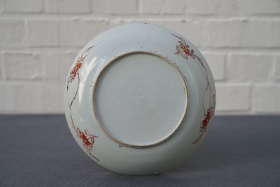 A fine Chinese famille rose plate with a bird among flowers, Yongzheng