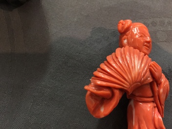 Six Chinese carved coral figures on wooden stands, 19/20th C.