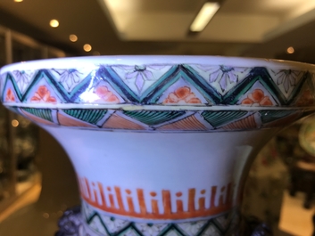 A Chinese famille verte vase with officials and warriors, 19th C.
