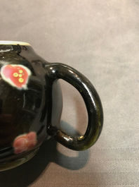 A small Chinese famille rose black ground teapot and cover, Yongzheng/Qianlong