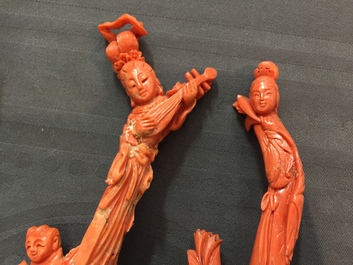 Six Chinese carved coral figures on wooden stands, 19/20th C.