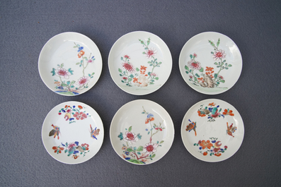 A Chinese famille rose teapot, nine cups and six saucers, Qianlong