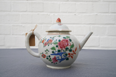 A Chinese famille rose teapot, nine cups and six saucers, Qianlong
