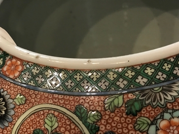 A Chinese famille noire jardini&egrave;re on stand, 19th C.