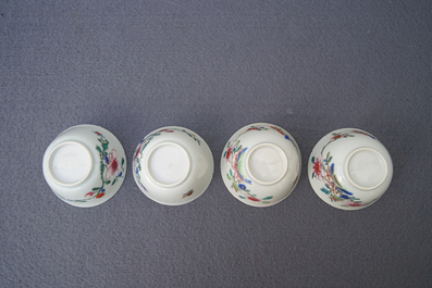 A Chinese famille rose teapot, nine cups and six saucers, Qianlong
