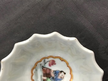 A Chinese famille rose cup and saucer with fishermen, Yongzheng