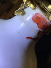 Une paire de vases en porcelaine de Chine famille rose mont&eacute;s comme candelabres, Yongzheng