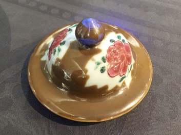 A Chinese capucin ground famille rose five-piece garniture with floral design, Qianlong