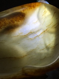 A Chinese lotus-shaped russet jade libation cup, 18/19th C.