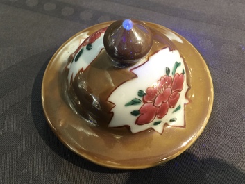 A Chinese capucin ground famille rose five-piece garniture with floral design, Qianlong