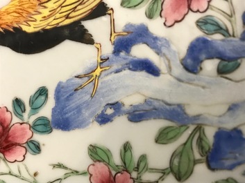A Chinese famille rose cup and saucer with roosters, Yongzheng