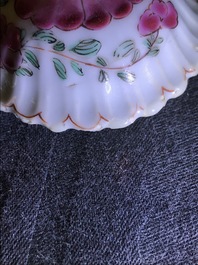 Een Chinese famille rose theepot en deksel met bloemen en takken in reli&euml;f, Yongzheng