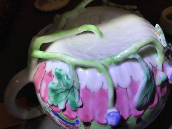 Een Chinese famille rose theepot en deksel met bloemen en takken in reli&euml;f, Yongzheng