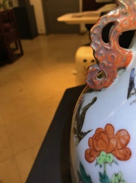 A Chinese famille rose 'phoenixes and pheasants' vase, 19th C.
