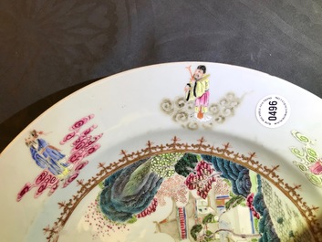 A Chinese famille rose "Eight Immortals" charger with a central landscape, Qianlong