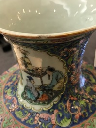 A pair of Chinese famille rose rouleau vases, 19th C.