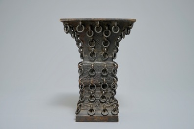 A Chinese archaistic ringed bronze fanggu vase, Ming