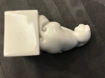 A pair of Chinese Dehua blanc de Chine seals with lions, impressed sealmarks, Kangxi