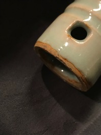 A Chinese longquan celadon model of a phallus, Ming or later