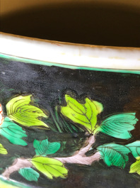A pair of large Chinese famille noire vases and covers, 19/20th C.