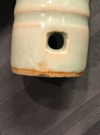 A Chinese longquan celadon model of a phallus, Ming or later