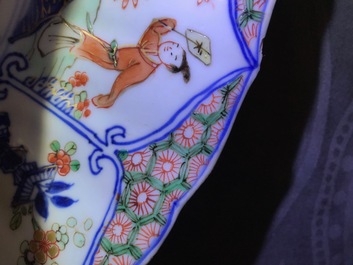Un plat en porcelaine de Chine famille verte aux armes de Louvain, Kangxi/Yongzheng