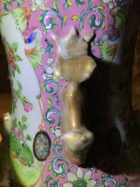 A pair of Chinese pink ground Canton vases, 19th C.