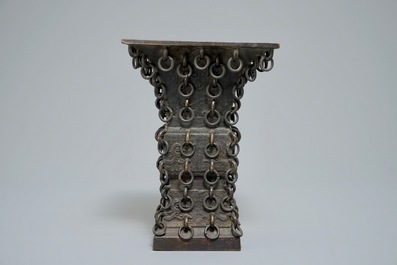 A Chinese archaistic ringed bronze fanggu vase, Ming