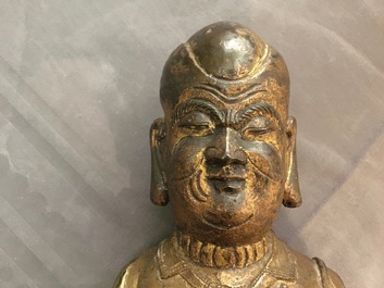 A large Chinese gilt bronze figure of Mahakasyapa, Ming