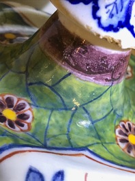 A polychrome Dutch Delft candlestick, 18th C.