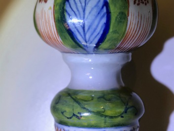 A polychrome Dutch Delft candlestick, 18th C.