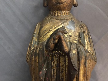 A large Chinese gilt bronze figure of Mahakasyapa, Ming