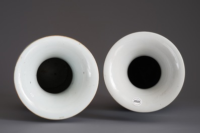 Two Chinese famille rose vases with figures in a garden, 19/20th C.