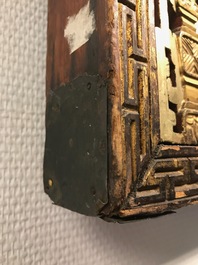 A rare Chinese gilt wood and reverse glass painted mirror, 2nd half 18th C.