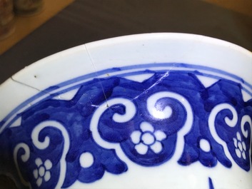 A Chinese blue and white five-piece garniture with port views, 19th C.