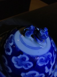 Two Chinese blue and white and famille rose vases and covers, 19/20th C.