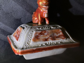 Three Chinese famille rose 'mandarin' vases and covers, Qianlong