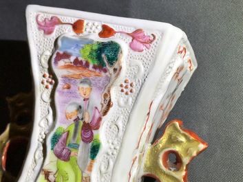 Three Chinese famille rose 'mandarin' vases and covers, Qianlong