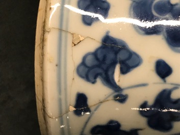 A Chinese blue and white four-piece garniture with floral design, Kangxi