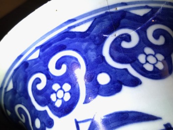 A Chinese blue and white five-piece garniture with port views, 19th C.