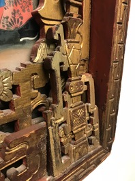 A rare Chinese gilt wood and reverse glass painted mirror, 2nd half 18th C.