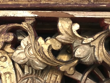 A rare Chinese gilt wood and reverse glass painted mirror, 2nd half 18th C.