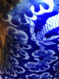 Two Chinese blue and white and famille rose vases and covers, 19/20th C.