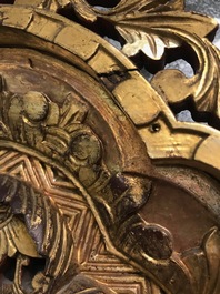 A rare Chinese gilt wood and reverse glass painted mirror, 2nd half 18th C.