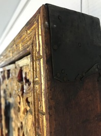 A rare Chinese gilt wood and reverse glass painted mirror, 2nd half 18th C.